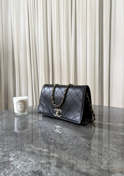 Chanel Single Flap Twist Lock Lambskin Black 24K Gold HW