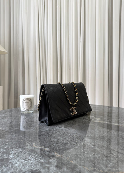 Chanel Single Flap Twist Lock Lambskin Black 24K Gold HW